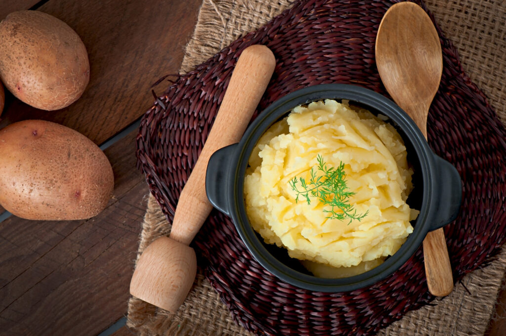 Elegant catering setup with gourmet mashed potatoes