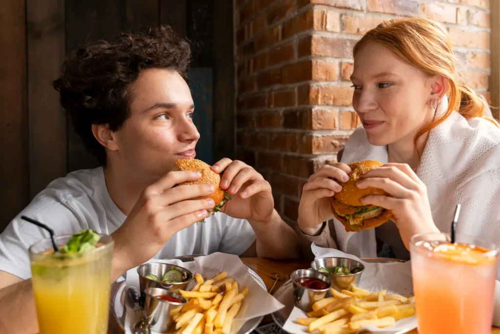 family enjoying homemade burger