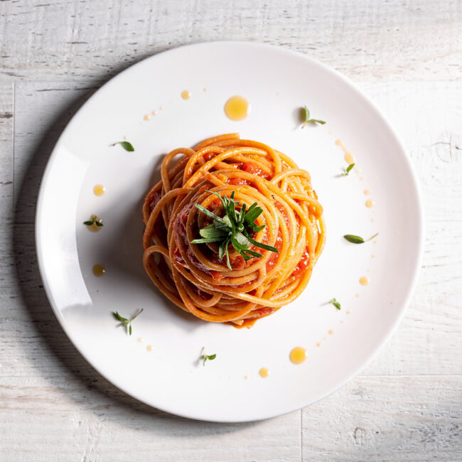A golden, bubbly pan of baked spaghetti fresh from the oven.