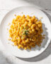 A golden, bubbling baking dish of the best gluten free mac and cheese, ready to be served.
