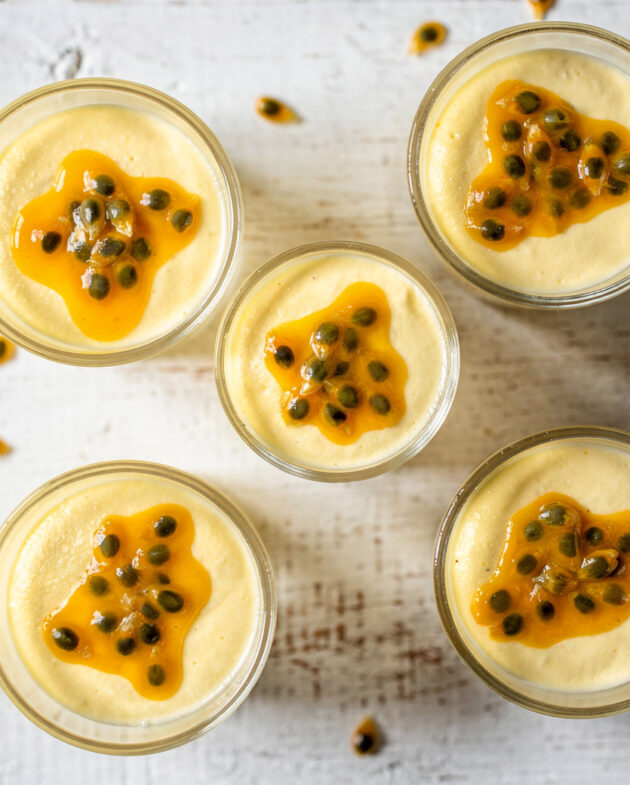 A light and creamy Brazilian passion fruit mousse served in a glass, topped with fresh pulp and seeds.