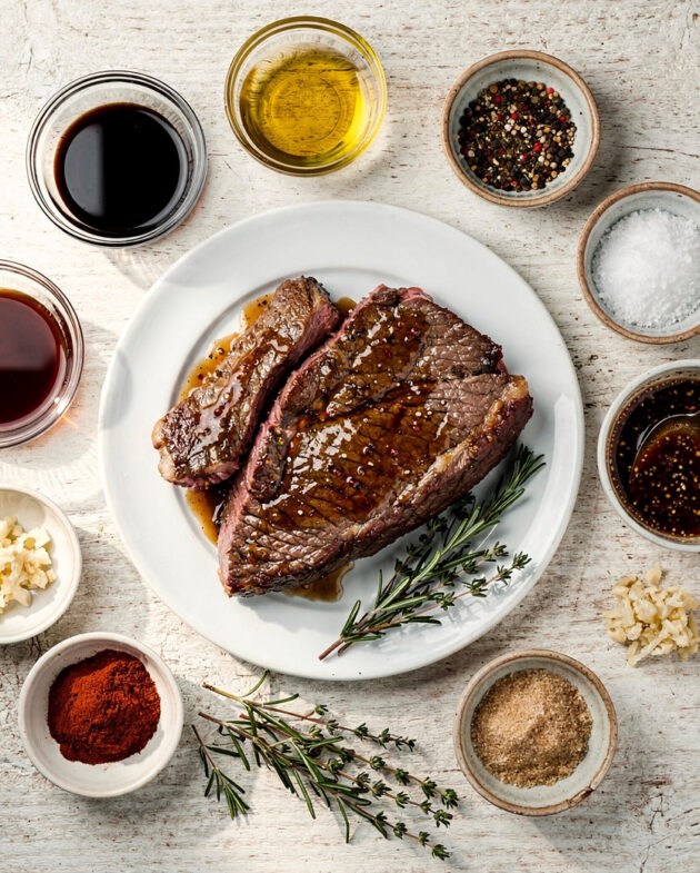A close-up shot of a flavorful brisket marinade recipe in a glass bowl, ready to transform a cut of beef.