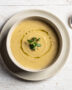 A steaming bowl of homemade campbell's yes soup, creamy and inviting, with a sprinkle of fresh herbs.
