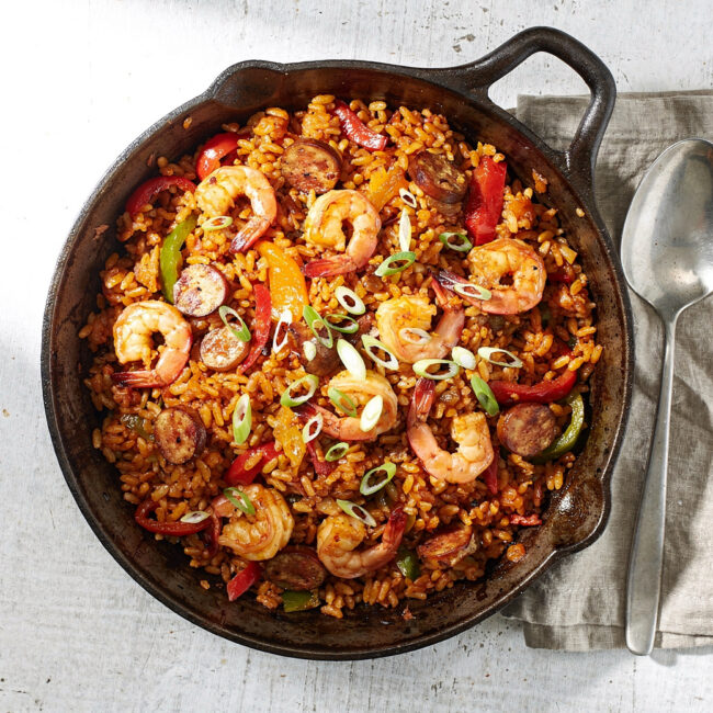 A vibrant overhead shot of the finished jambalaya recipe, showcasing the mix of chicken, sausage, and rice.