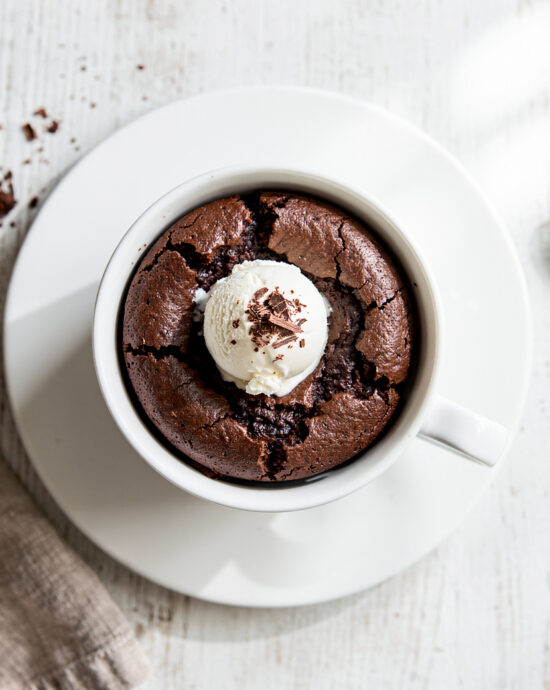 A delicious mug brownie recipe with a fudgy center and crackly top, ready to enjoy.