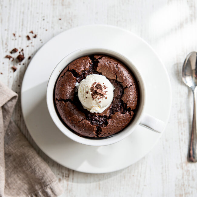 A delicious mug brownie recipe with a fudgy center and crackly top, ready to enjoy.
