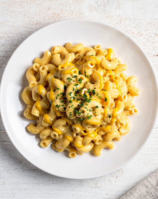 A creamy, golden baked mac and cheese showcasing the perfect use of mustard in mac and cheese for enhanced flavor.