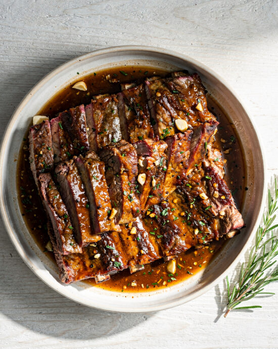 The perfect slab of pork ribs, coated in a glossy, deeply caramelized rib marinade overnight.
