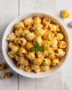 A bowl of freshly made smartfood doritos popcorn, perfectly seasoned and ready to enjoy.