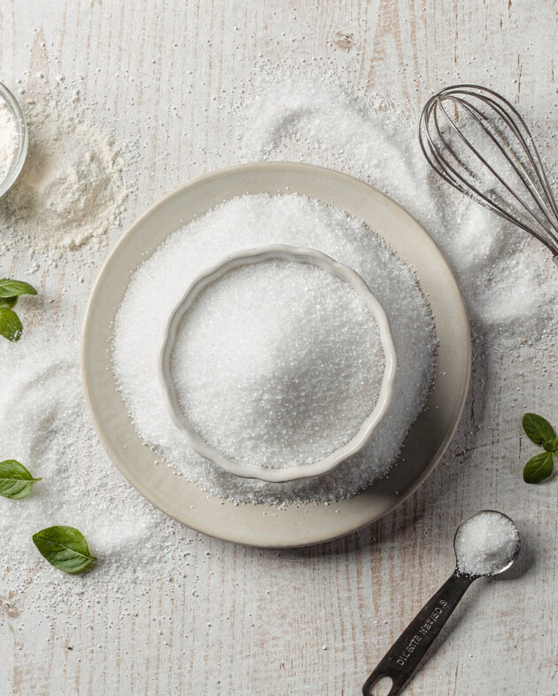 A slice of moist buttermilk coffee cake made with a white sugar alternative for baking, showing a perfect crumb and cinnamon streusel topping.