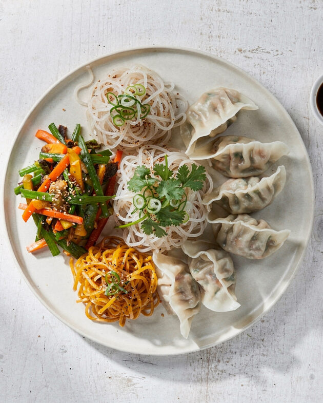 A jar of homemade stir-fry sauce for gluten free Chinese food, showcasing its glossy texture.
