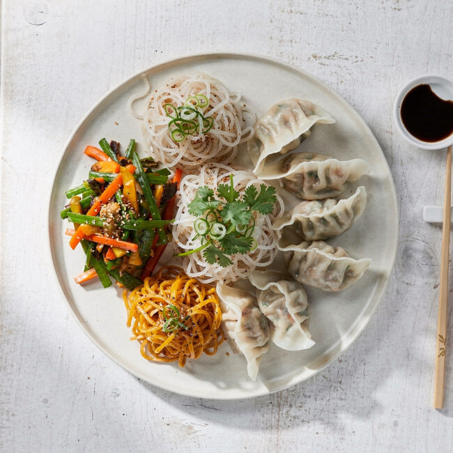 A jar of homemade stir-fry sauce for gluten free Chinese food, showcasing its glossy texture.
